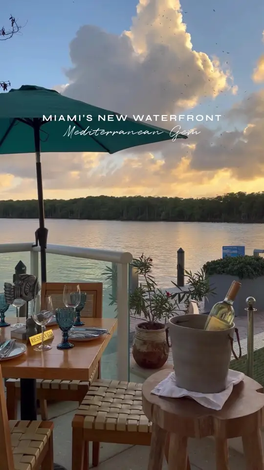 Mykonos Kitchen and Bar in Sunny Isles Beach showing review, visit, sunset views, family-style dishes, handcrafted cocktails, video by fashion.eat.travel on TikTok