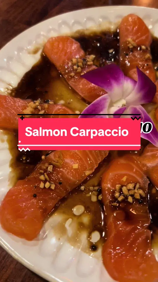  in Florida showing salmon carpaccio, truffle oil, sea salt, fried garlic, japanese dressing, video by nakamasushi2023 on TikTok