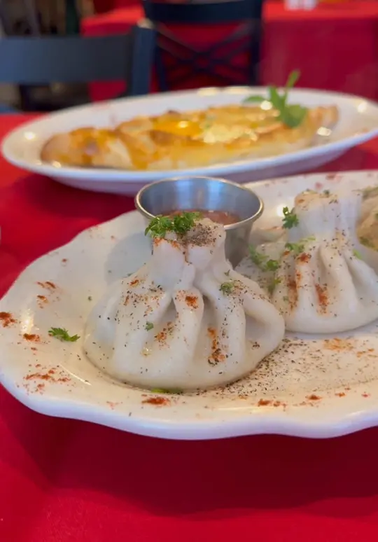 Nene's Restaurant & Bar in Tampa showing food, adjaruli khachapuri, chicken kyiv, khinkali, video by eatlocalflorida on TikTok