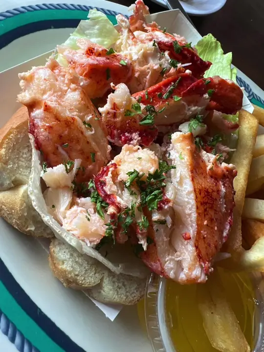 New England Eatery & Pub in Melbourne Beach showing food, lobster roll, video by New England Eatery & Pub on Facebook