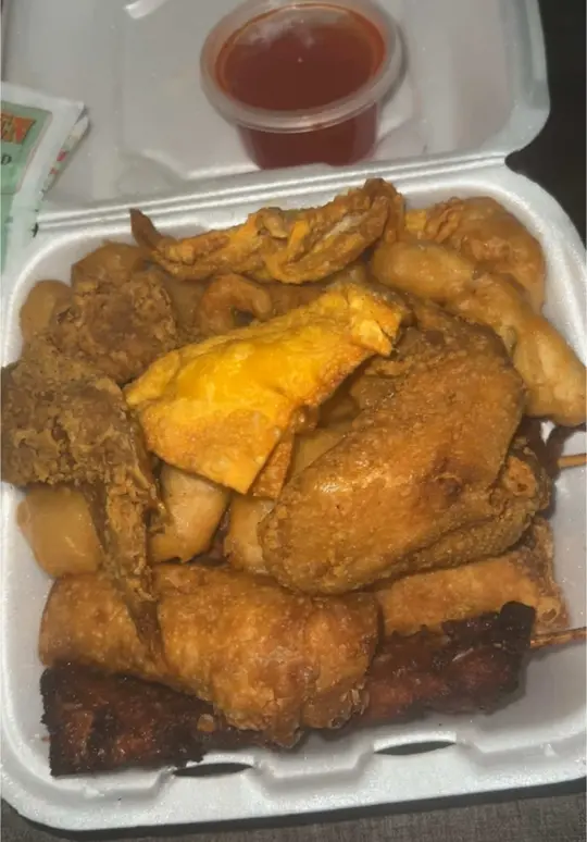 No.1 Chinese Restaurant in Morrow showing food review, pu pu platter, crab rangoon, fried shrimp, fried chicken, chicken on a stick, video by kannetriaallexus on TikTok