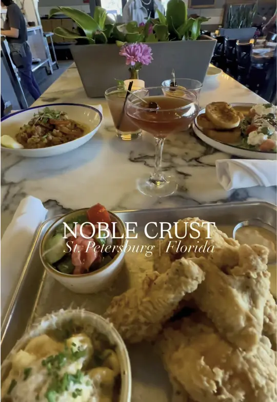 Noble Crust in St. Petersburg showing southern cuisine, italian cuisine, cocktails, fried chicken, shrimp risotto, pasta, video by thingstodotampabay on TikTok