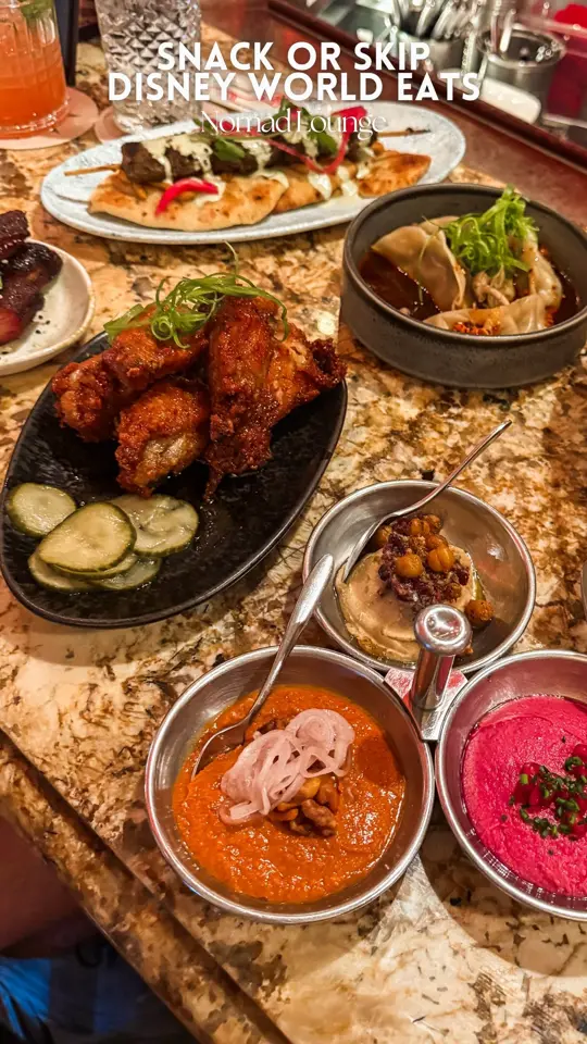 Nomad Lounge in Lake Buena Vista showing visit, snack or skip, new-ish menu items, video by Bethany Vinton on Facebook