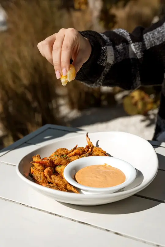 North Beach Fish Camp in Neptune Beach showing food, crispy cocktail crab claw with cajun remoulade, video by North Beach Fish Camp on Facebook