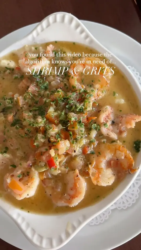 North Beach Fish Camp in Neptune Beach showing shrimp and grits, comfort dish, video by North Beach Fish Camp on Facebook