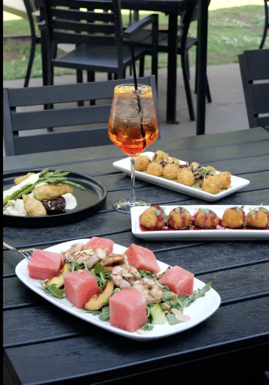 North End Kitchen & Bar in Roswell showing summer menu, watermelon, aperol spritz, video by northendkitchen on TikTok