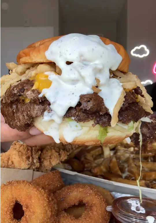 North South Grill in Pembroke Pines showing double cheese burger, poutine fries, video by cookitgirleats on TikTok