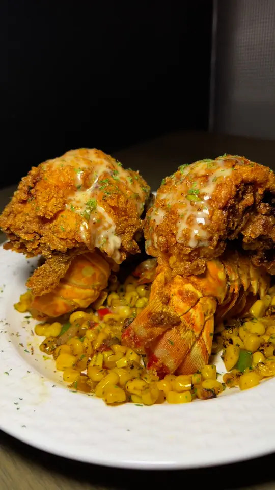 Nouveau Bar & Grill – Jonesboro in Jonesboro showing food, fried lobster tails, video by Nouveau Bar and Grill on Facebook