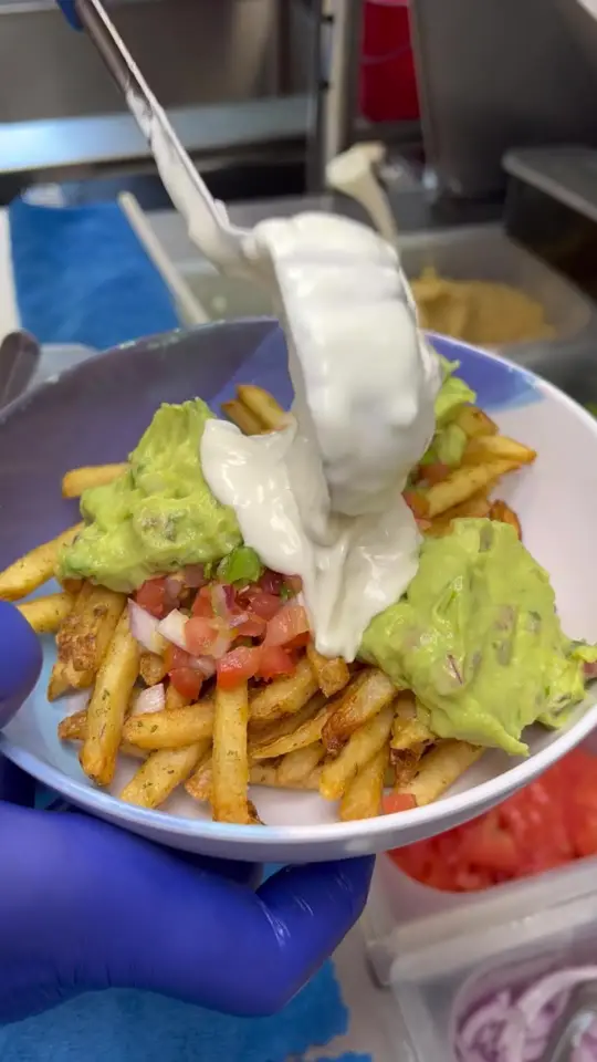  in Florida showing food, loaded fries, video by Foody Fetish on Facebook