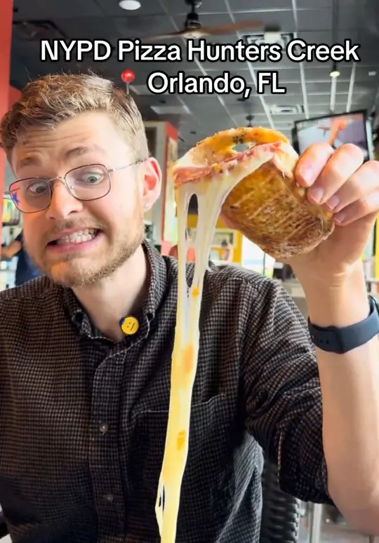 NYPD Pizza Hunters Creek in Orlando showing pizza, cheesecake, video by itsryansreview on TikTok