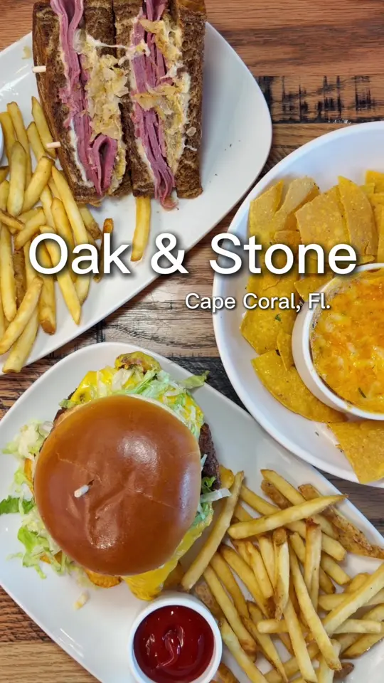 Oak And Stone in Bradenton showing brunch, lunch, dinner, drinks, game days, philly cheesesteak egg rolls, jumbo bavarian pretzel, voodoo chicken sandwich, cacio e pepe pizza, video by ariannavandeusen5 on TikTok