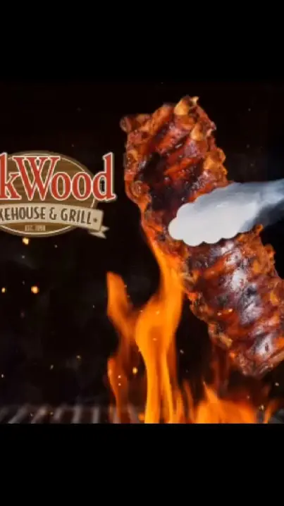 Oakwood Smokehouse & Grill in Eustis showing food, baby back ribs, video by Oakwood Smokehouse & Grill on Facebook