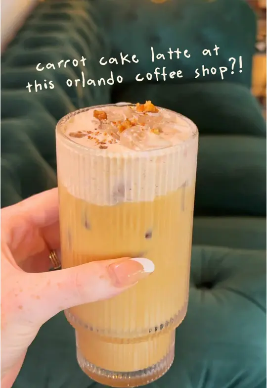 Olivia's Cafe in Lake Buena Vista showing coffee shop visit, cozy atmosphere, remote work spot, carrot cake latte, video by oliviashannonwolk on TikTok