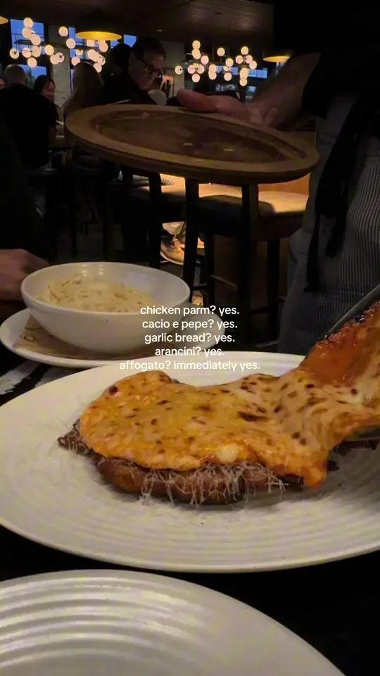 OLIVIA in Tampa showing visit, italian food, arancini, tableside chicken parm, video by allissa.nic0le on TikTok