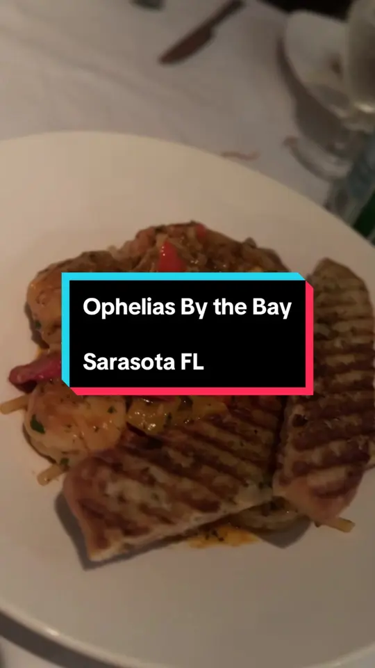 Ophelia's on the Bay in Sarasota showing review, visit, farm heritage breed pork belly, prince, video by chezeggrollz on TikTok