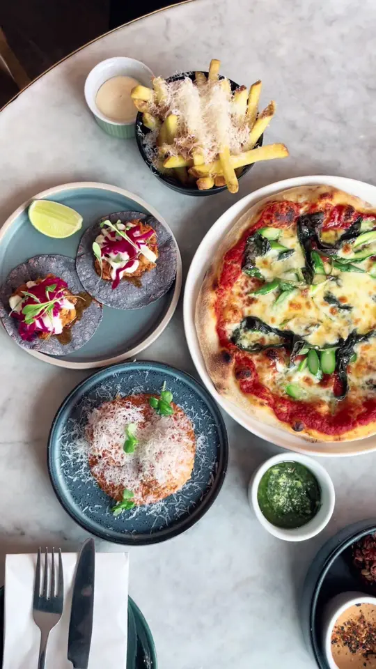 Origin craft beer and pizza cafe Landings in Sarasota showing small plates, craft beer, wine, seasonal cocktails, lunch, vibrant atmosphere, video by lovenorthallerton on TikTok
