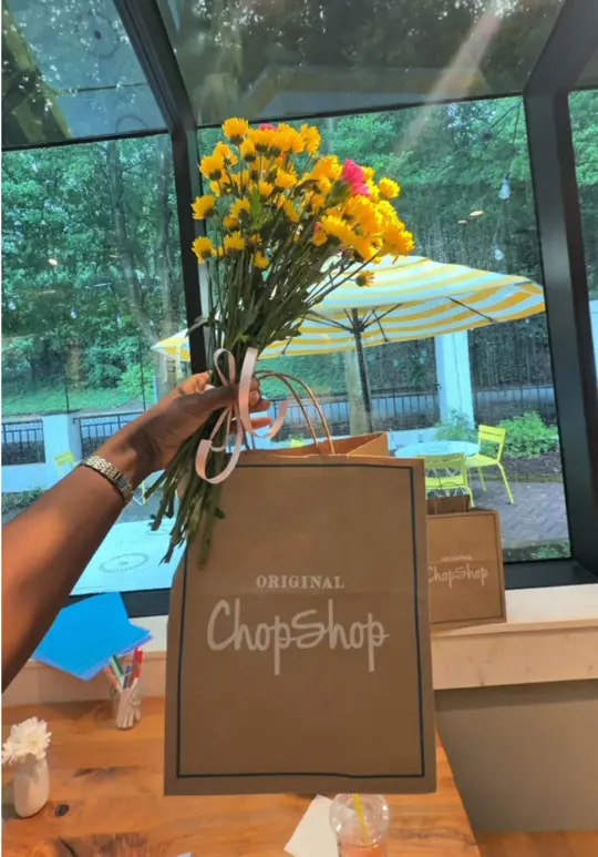Original ChopShop in Atlanta showing food, flowers, bloom bar, video by emerald.imani on TikTok