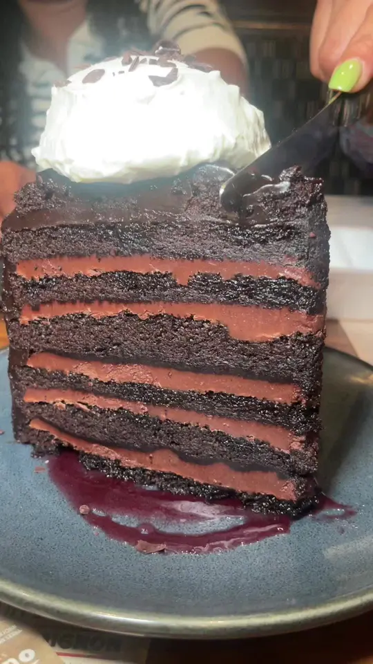 Outback Steakhouse-Daytona Beach in Daytona Beach showing dessert, chocolate cake tower, video by biteswithsav on TikTok