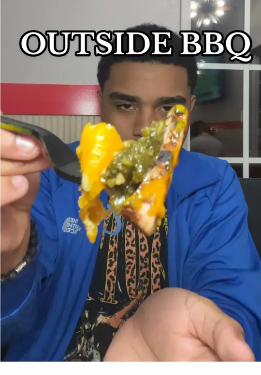 Outside BBQ in St. Pete Beach showing review, black owned restaurant, video by zaybotorrence on TikTok