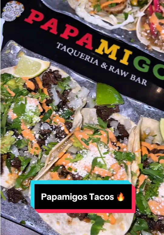 Papamigos Coconut Creek in Coconut Creek showing food, pile high nachos / wings / irie tacos / butcher tacos, video by choerlinecadet on TikTok