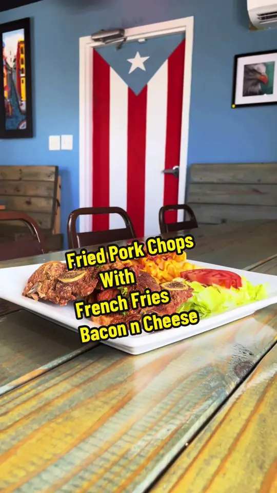 Papi's Cafe & Grill in Fort Walton Beach showing fried pork chops, french fries, bacon, cheese, video by papiscafeandgrill7 on TikTok