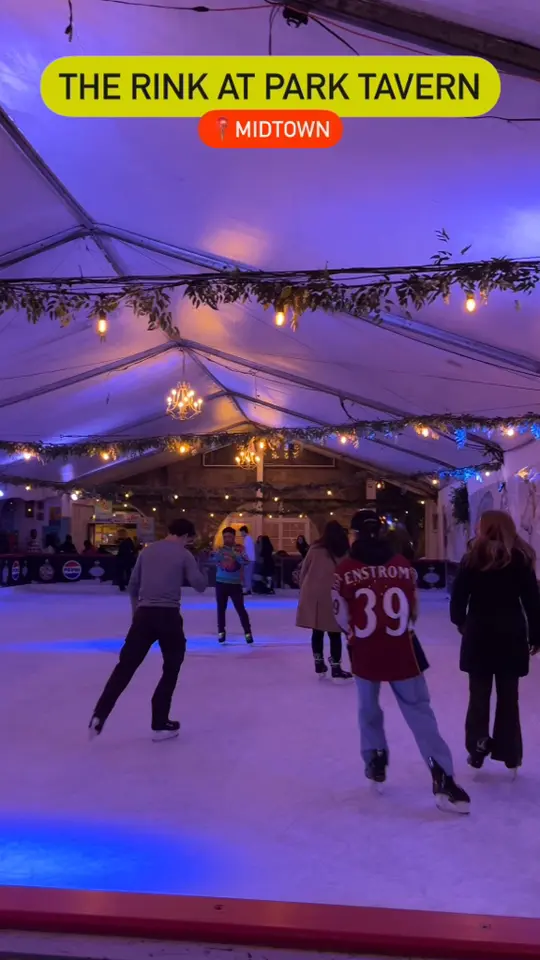 Park Tavern in Atlanta showing iceskating, holiday pop up bar, festive cocktail, video by Access Atlanta on Facebook