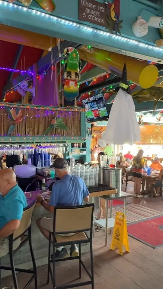 Parrot Key Caribbean Grill in Fort Myers Beach showing atmosphere, bay view, video by Parrot Key Caribbean Grill on Facebook