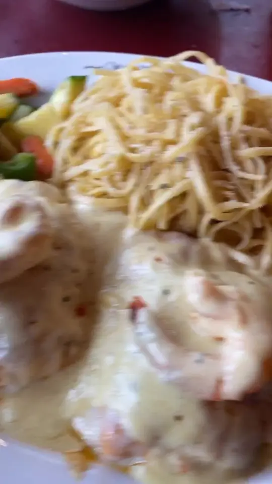 Pasta Bella in Marietta showing restaurant visit, pasta dish, marco pollo, video by iamerikaward on TikTok