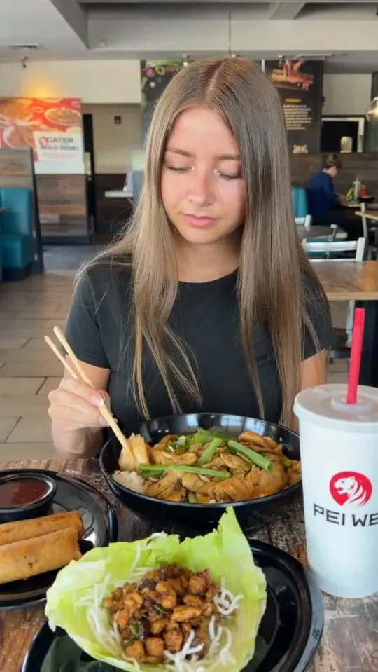 Pei Wei Asian Kitchen in Coral Springs showing food, dumplings, noodles, shrimp, rice, vegetables, video by Pei Wei Asian Kitchen on Facebook