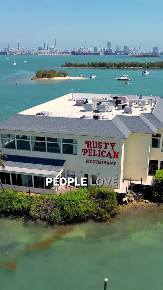 Pelican Restaurant in Miami Beach showing restaurant visit, chilean sea bass, passion of soul cocktail, video by rustypelicanmiami on TikTok