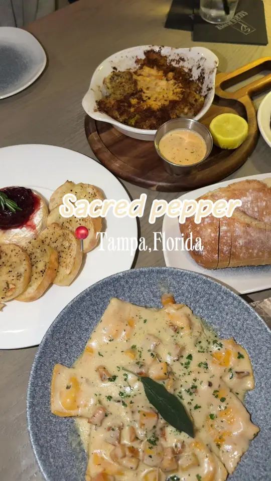 Pepper Pot Restaurant in Jacksonville showing restaurant visit, elevated american cuisine, cocktail, morning in italy, baked brie with crostini, stuffed artichokes, butternut squash ravioli, video by mangiawithtay on TikTok