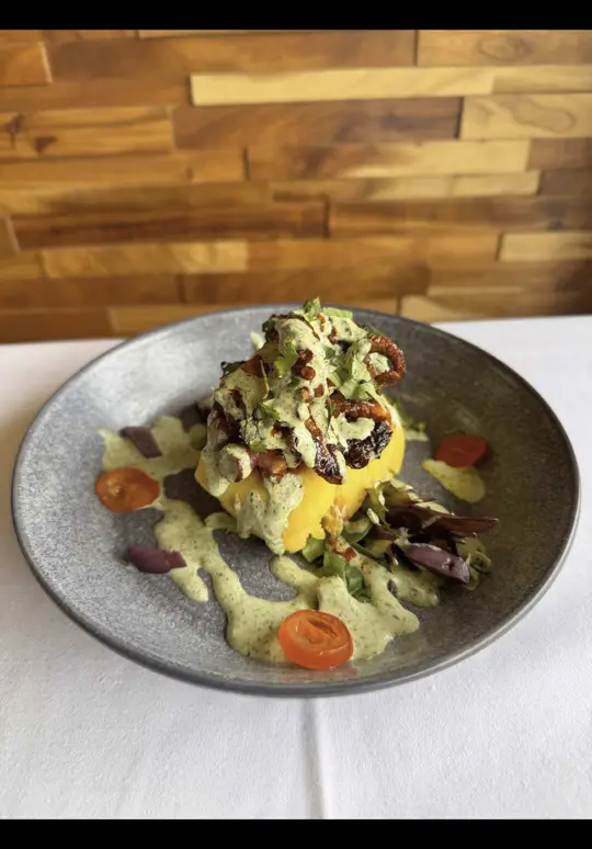Peru Wok Cuisine in Jupiter showing food, causa con pulpo anticuchado en salsa de ocopa, video by peruwokcuisine on TikTok