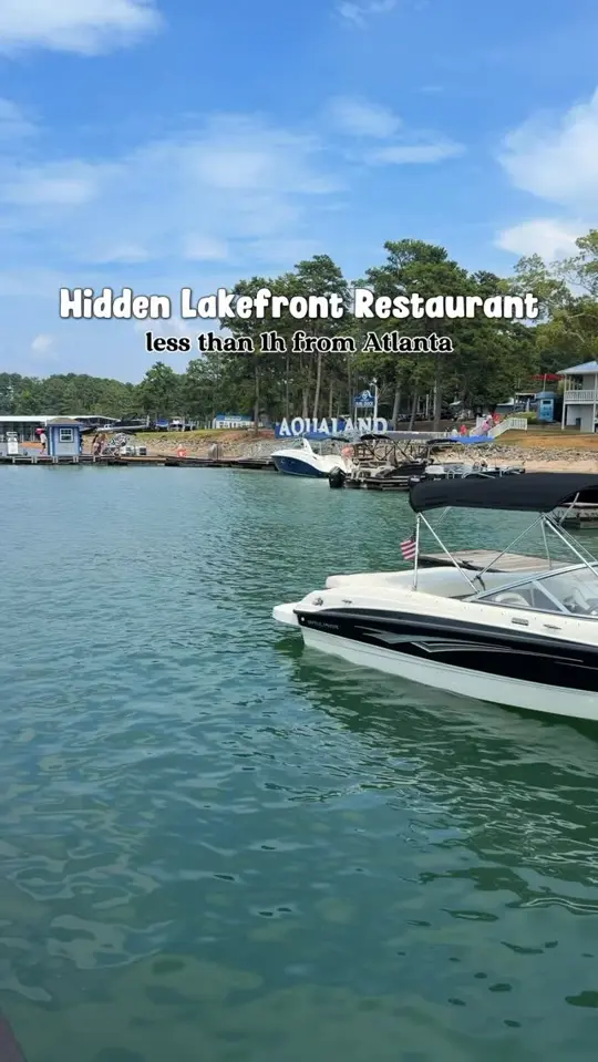 Pig Tales on Lake Lanier in Flowery Branch showing bbq, burgers, tacos, cold drinks, lake views, video by The.travel.ksu on Facebook