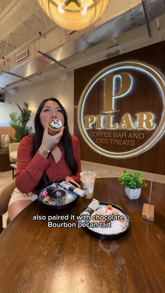 Pilar Coffee Bar & Iced Treats in Deerfield Beach showing review, almond croissant, chocolate bourbon pecan tart, toasted marshmallow latte, video by natalia_tries_it on TikTok