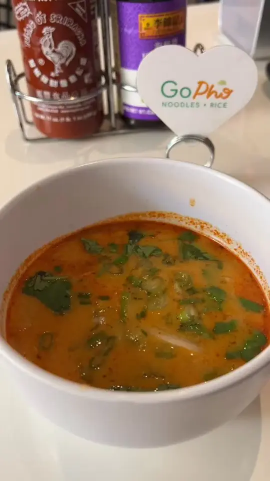 Pink Buddha Restaurant in Davie showing food, banh mi, curry broth, video by GoPho on Facebook