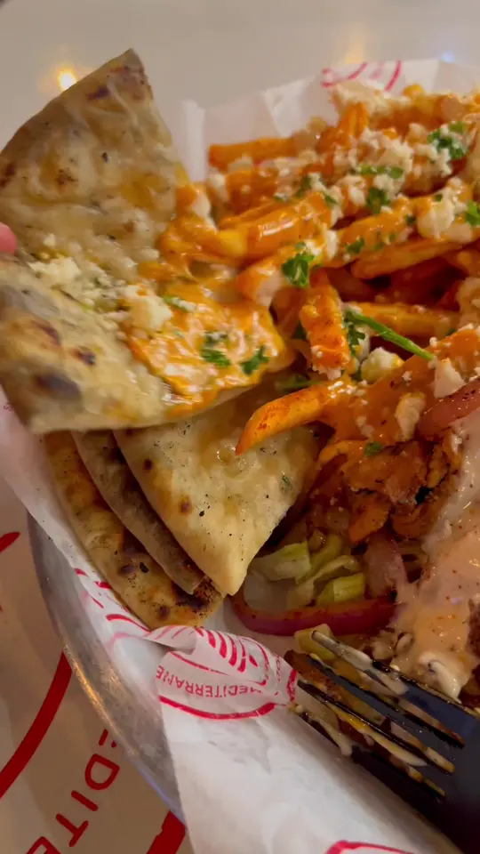 PITA Mediterranean Street Food - Augusta in Augusta showing food, falafel salad, chicken shawarma, greek fries, baklava cheesecake, video by Travel Augusta on Facebook