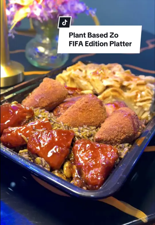 Plant Based Zo in Atlanta showing vegan food, fifa edition platter, sports viewing, watch party, video by iamchivaria_shay on TikTok