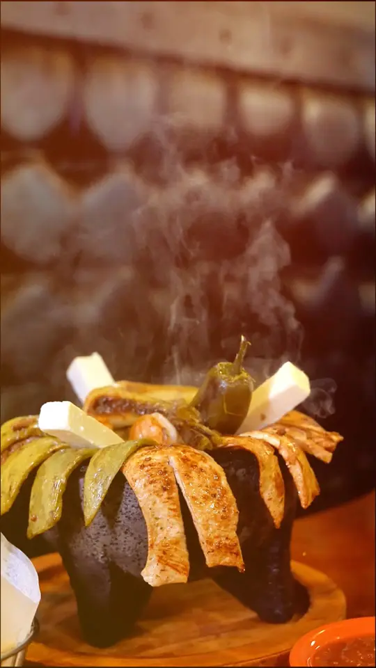 Plaza Mexico Restaurant Bar & Grill in Port Charlotte showing food, molcajete, video by Plaza Mexico Port Charlotte on Facebook