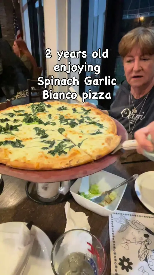  in Florida showing pizza, spinach garlic bianco pizza, video by savorthemoments on TikTok