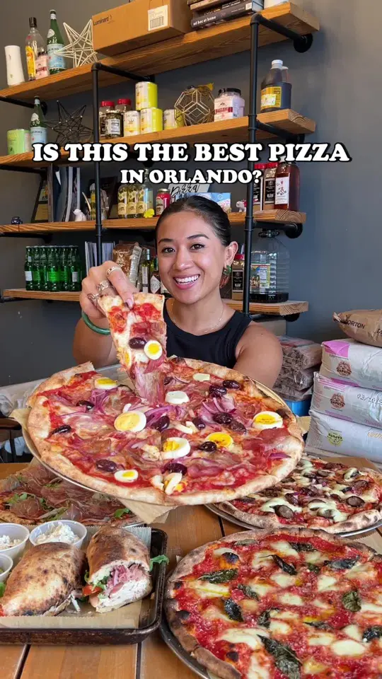 Posto Pizza in Celebration showing pizza, wood fire oven, review, video by explorewithgg on TikTok