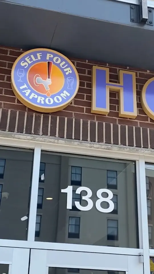 Pour House at Grand Central in Tampa showing visit, self-pour tap room, craft beer, seltzers, wine, pizza, pretzels, video by TvHAMILTON on Facebook