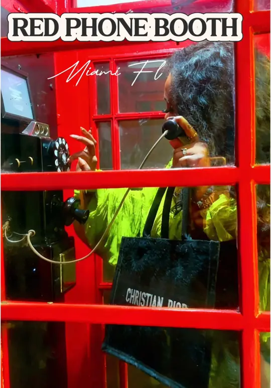 Red Phone Booth in Miami showing visit, prohibition-themed speakeasy atmosphere, handcrafted cocktails, shrimp pizza, truffle mushroom pizza, shrimp cocktails, burgers, video by vanity7even on TikTok