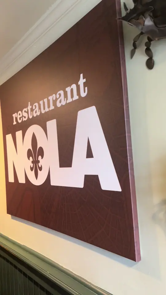 Restaurant Nola in Pensacola showing creole food, oysters, po'boys, gumbo, french toast, beignets, video by firstladi_kitad on TikTok