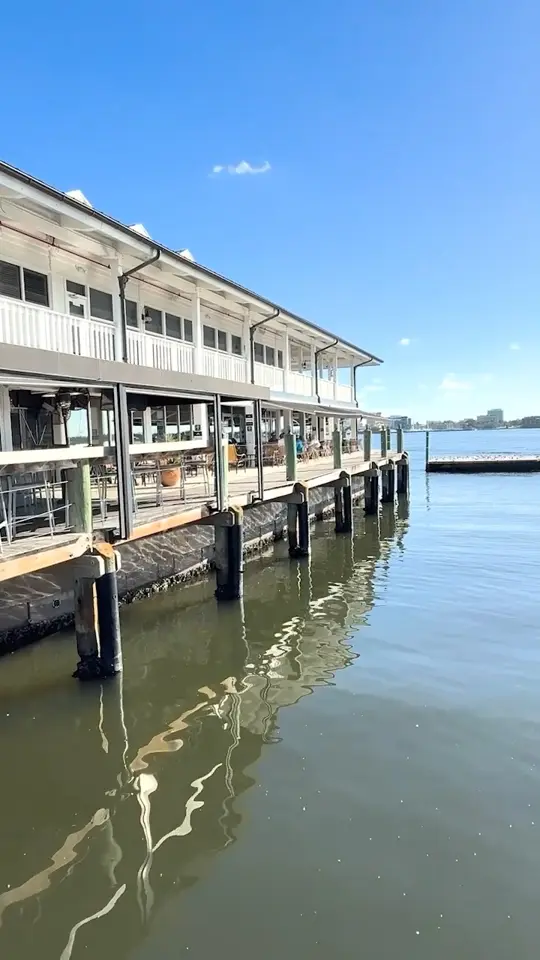  in Florida showing seafood, lobster pot pie, fresh grouper, handcrafted cocktails, sunny patio, marina views, video by Visit Bradenton Gulf Islands on Facebook