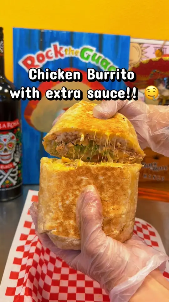 Rock the Guac in Cocoa Beach showing food, chicken burrito, video by Rock the Guac on Facebook