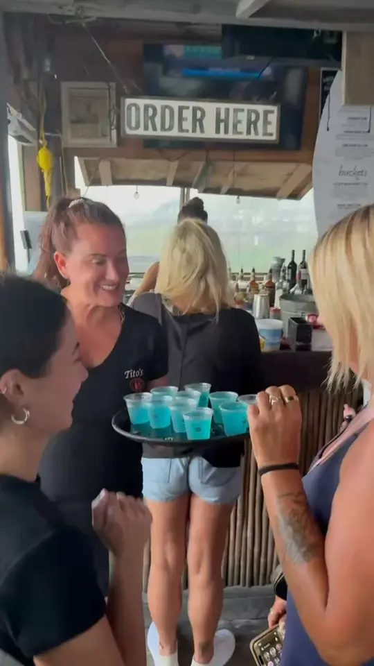 Royal Palm Grille Beach Bar in Miramar Beach showing cocktail, gulf view, video by Royal Palm Grille on Facebook