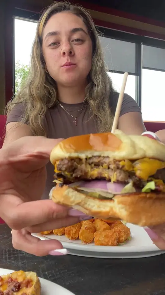Ruby Tuesday in Royal Palm Beach showing burger, sandwich, fries, video by Ruby Tuesday on Facebook