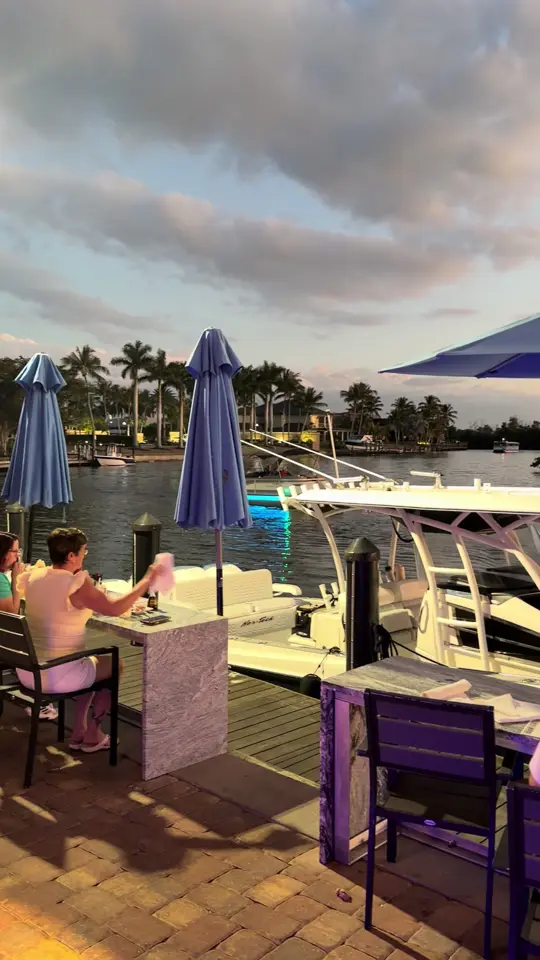 Rum Runners in St. Pete Beach showing cocktail, waterfront views, video by rumrunners.official on TikTok