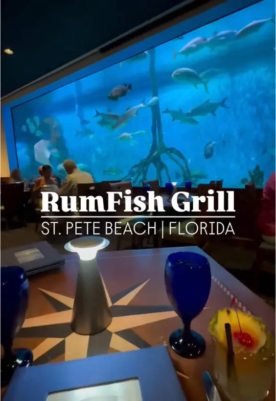 Rumfish Grill And Sports Bar in St. Pete Beach showing fresh seafood, craft cocktails, under the sea atmosphere, aquarium views, video by thingstodo.florida on TikTok