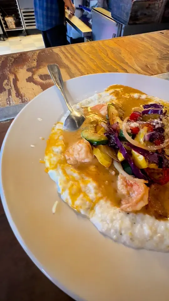 Rustic Cabin Bar & Grill LLC in Clarkesville showing soul food, shrimp grits, meatloaf, video by The Attic on Facebook